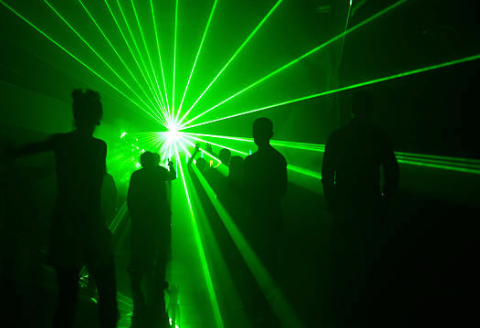 Image of people dancing at an underground nightclub